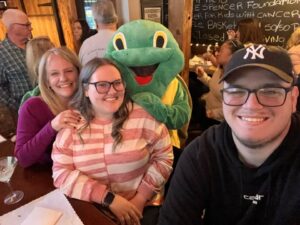 Sassy with happy partygoers