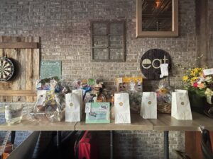 Raffle prize table at North Village Tavern fundraiser