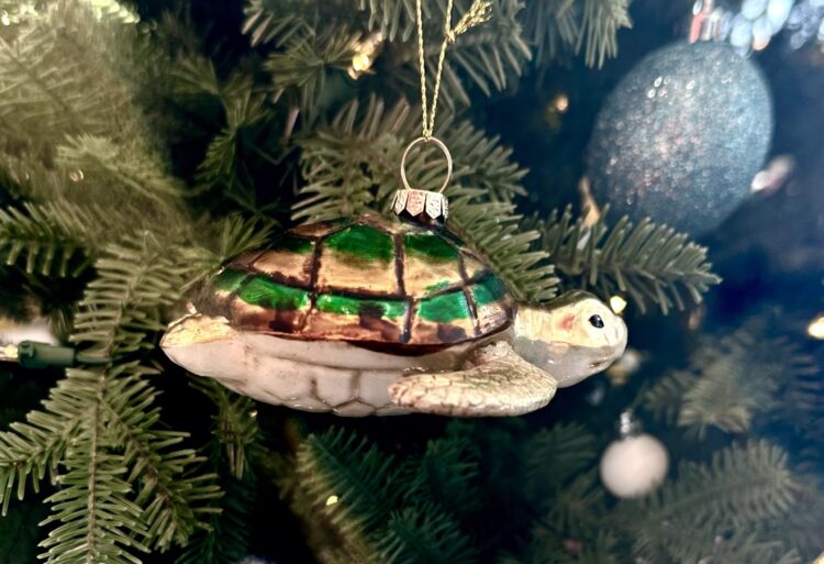 Glass turtle ornament on Christmas tree
