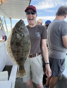 An angler amazed at a sizeable fish