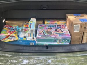 Toys and boxes in a car trunk