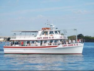 The Captain Eddie B III sailing with happy passengers