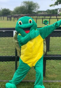 Sassy the Turtle welcoming campers to Saddle Rock Ranch Day Camp