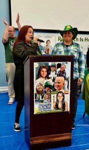 Gina Wuestmann and Jeanine Spencer making a donation from The Spencer Foundation