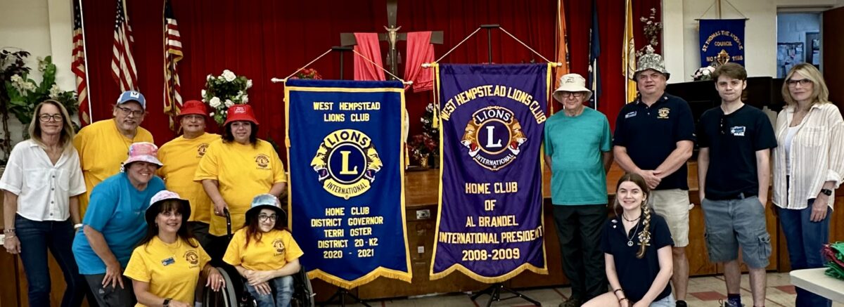 The Lions club gathers with Jeanine Spencer and the Brandel Murphy Foundation to assemble backpacks for kids