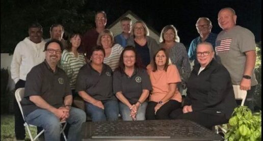 Lions In The Woods gather to present a donation to The Spencer Foundation