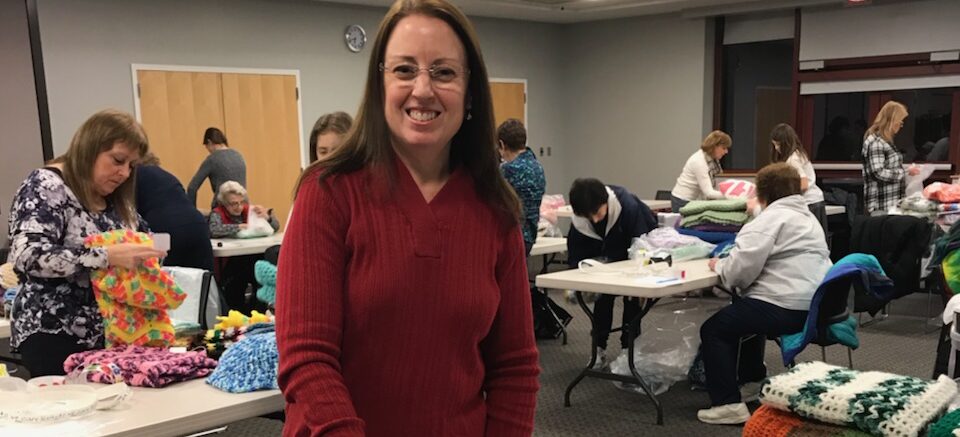 Jean Zakshevsky (JZ) at a WeCare Blankets wrapping party in 2018