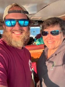 Jeanine Spencer and Captain Zach of the Captain Eddie B III